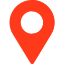 A simple red map location pin icon with a circular cutout in the center, displayed on a white background.